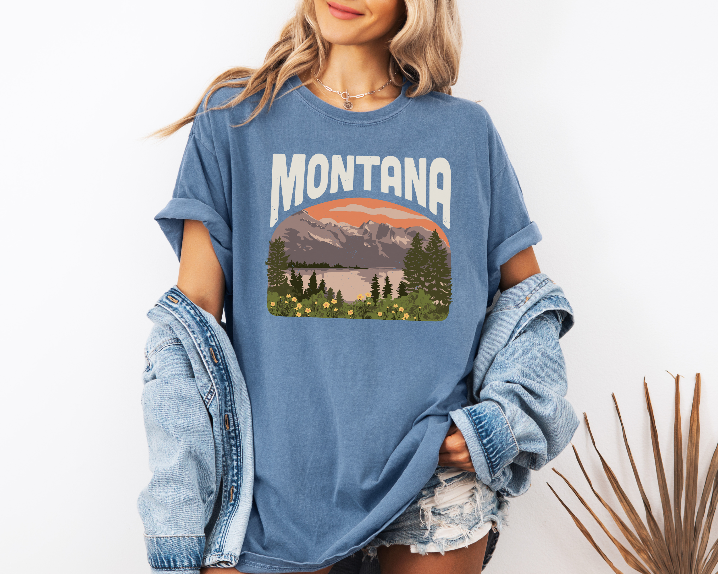 Montana tshirt with a scene of mountains and a lake.  Unisex graphic tee in blue jean