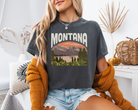 Montana tshirt with a scene of mountains and a lake.  Unisex graphic tee in pepper.