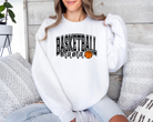 basketball mama sweatshirt with a college outline text , mama in cursive, and a small basketball