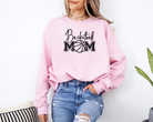 Basketball mom sweatshirt with a cute cursive font and a college text font.  Great apparel for basketball games.