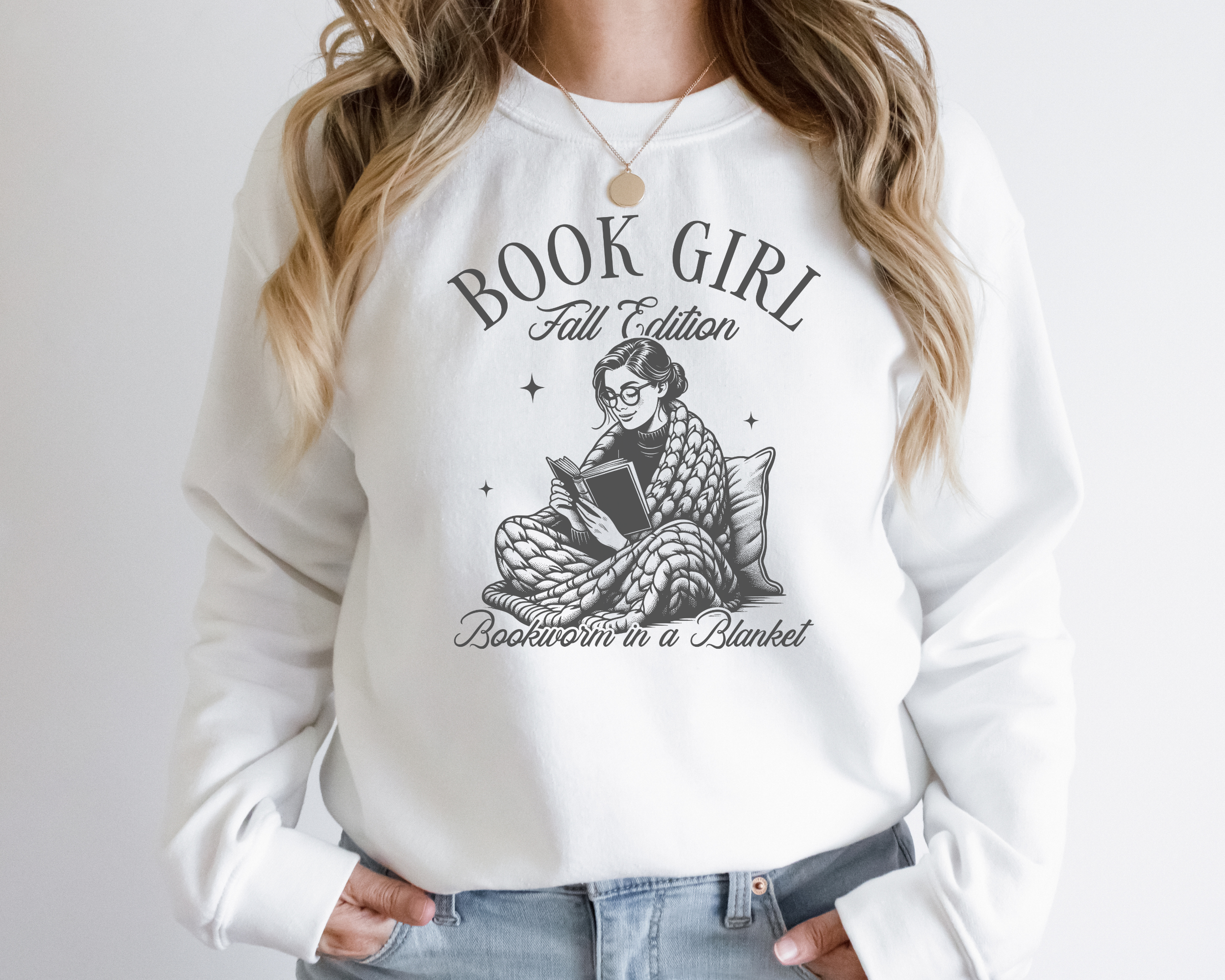 Book girl fall edition bookworm in a blanket sweatshirt in the color white with a dark grey design