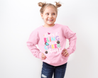 girls cheerleading sweatshirt in pink
