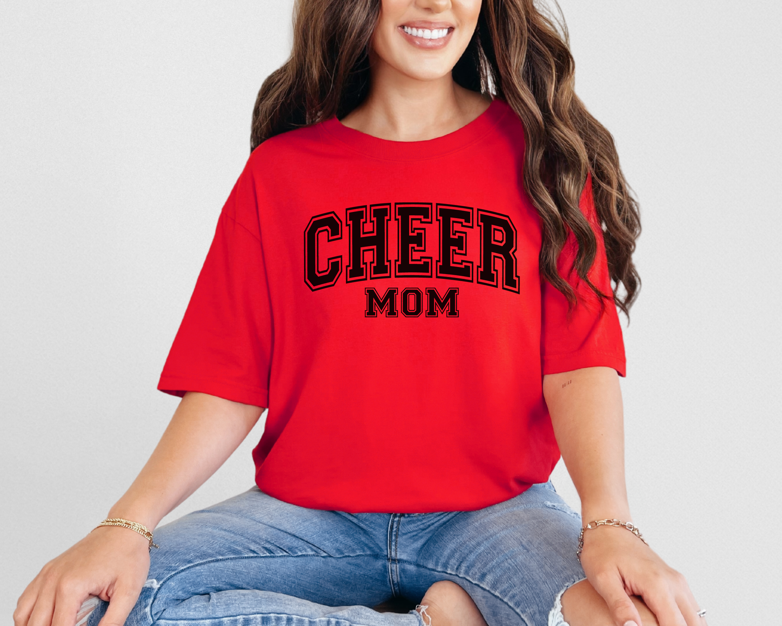 Cheer mom shirt in a college outline text in the color red