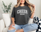 Cheer mom shirt in a college outline text in the color pepper