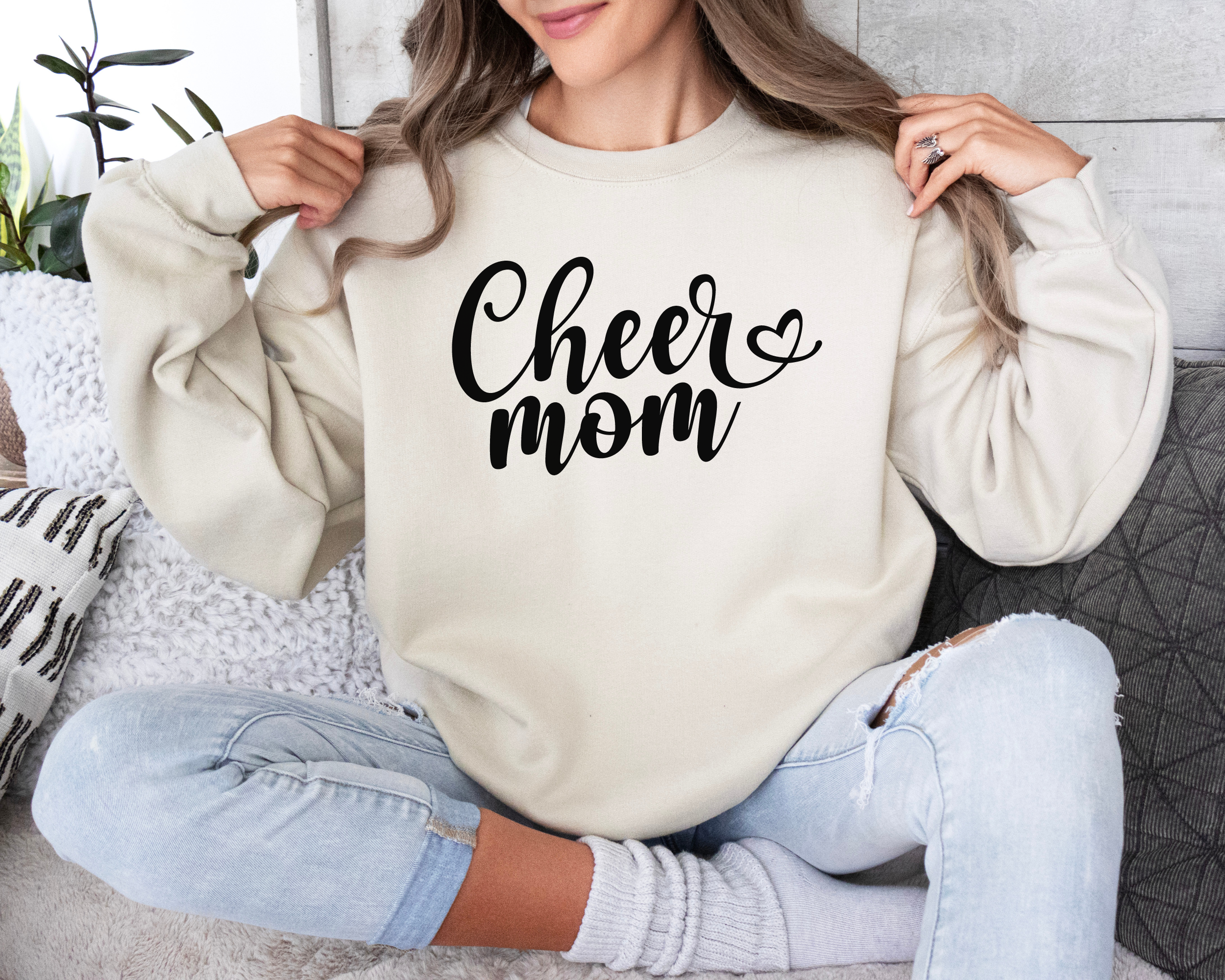 Cheer mom sweatshirt in a fun cursive font.