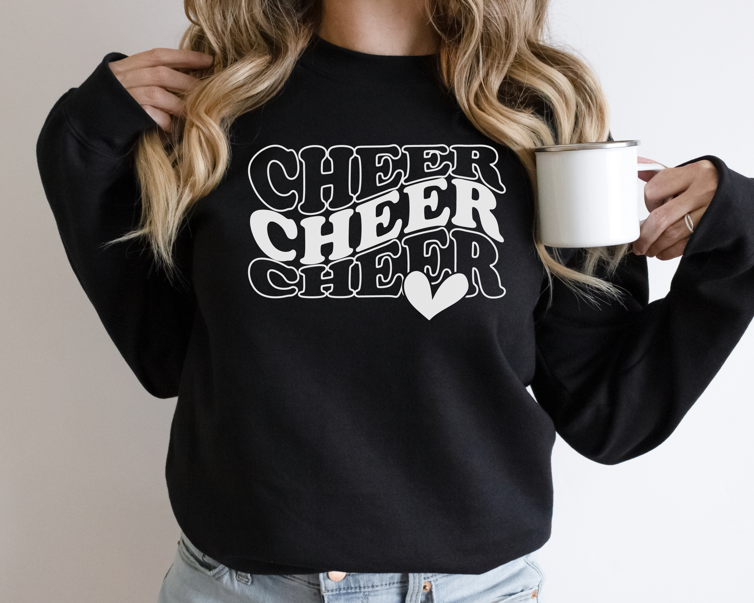 Black Cheer sweatshirt in in a wavy stacked text with a heart.