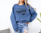 Indigo Cheer sweatshirt in in a wavy stacked text with a heart.