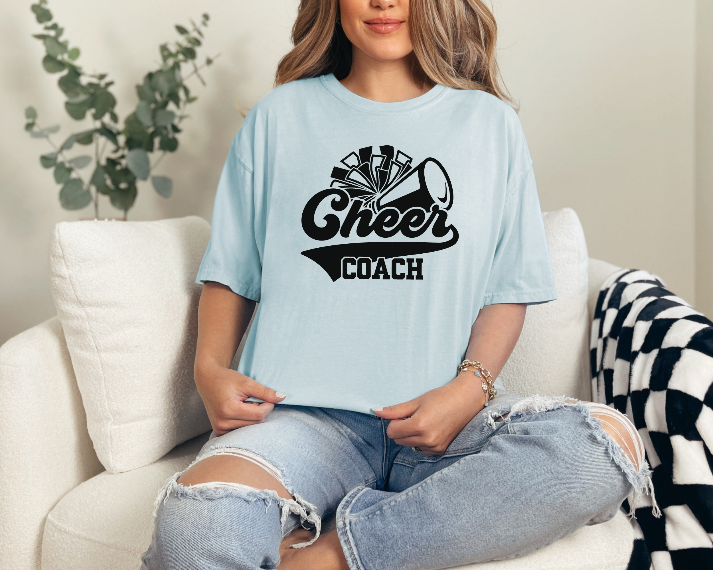 Retro cheer coach shirt with a pom pom and a megaphone.