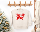 Holly jolly toddler christmas sweatshirt in heather natural with red text and little stars