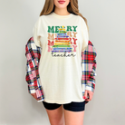 Cute Christmas tshirt for teachers that says merry teacher stacked with a crayon tree.