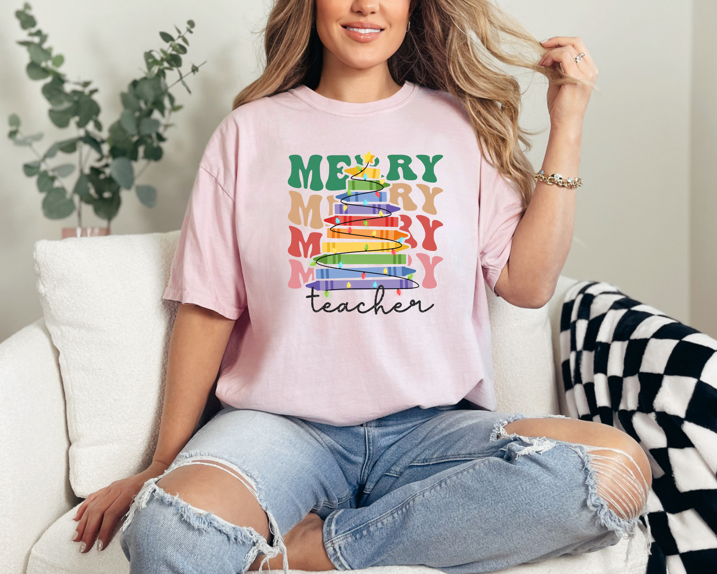 Cute Christmas tshirt for teachers that says merry teacher stacked with a crayon tree.