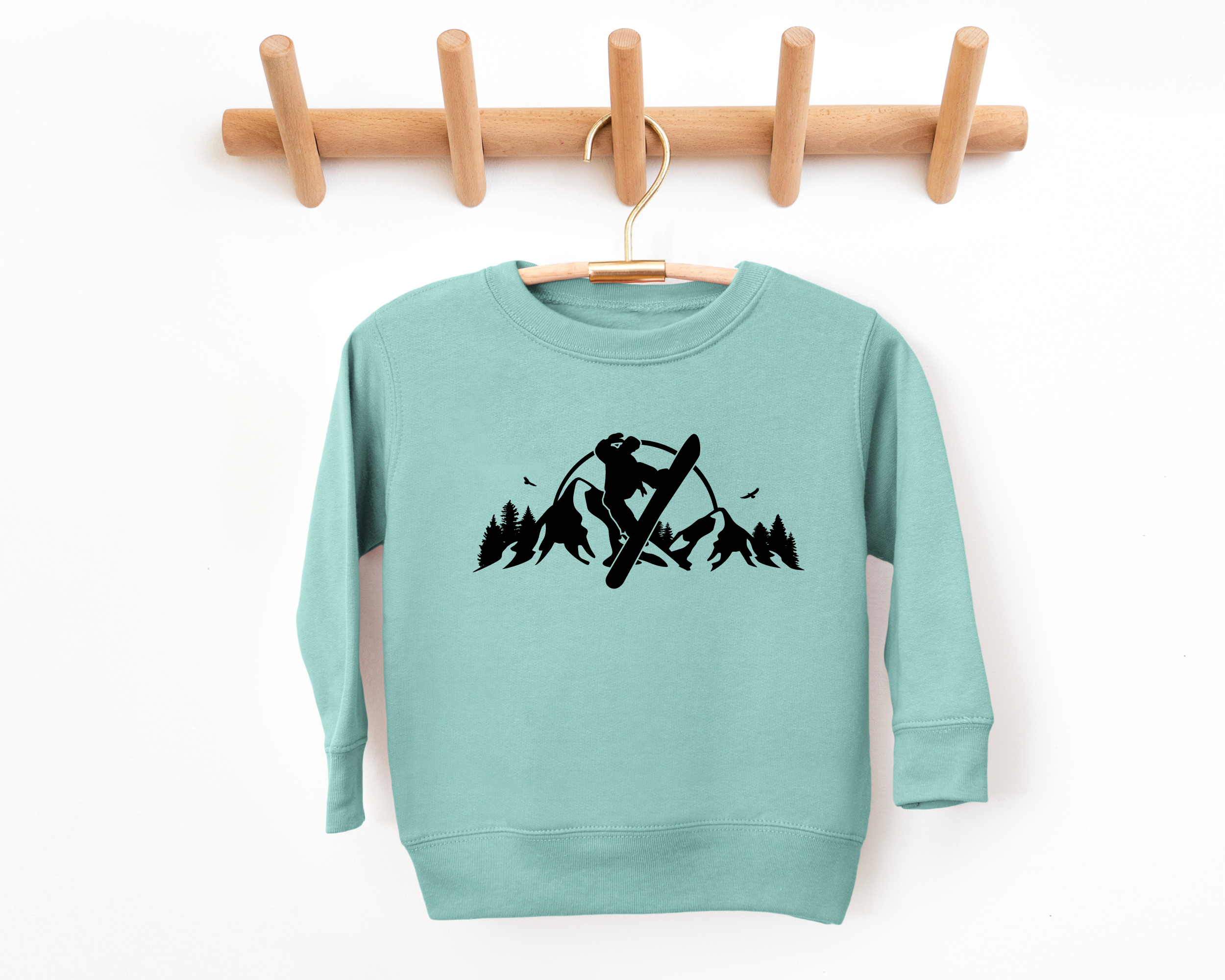 Snowboarding on a mountain kids and toddler sized crewneck sweatshirt