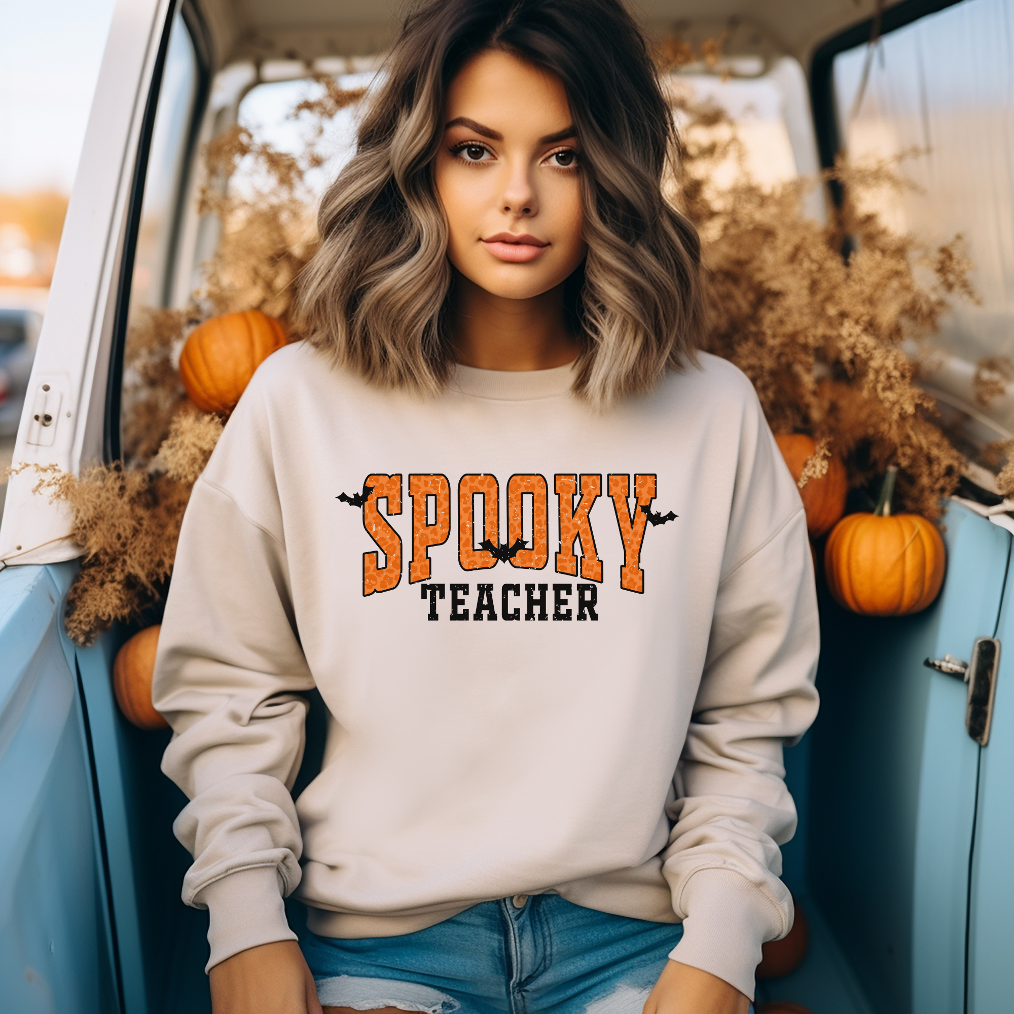 Spooky teacher crewneck sweatshirt in sand.